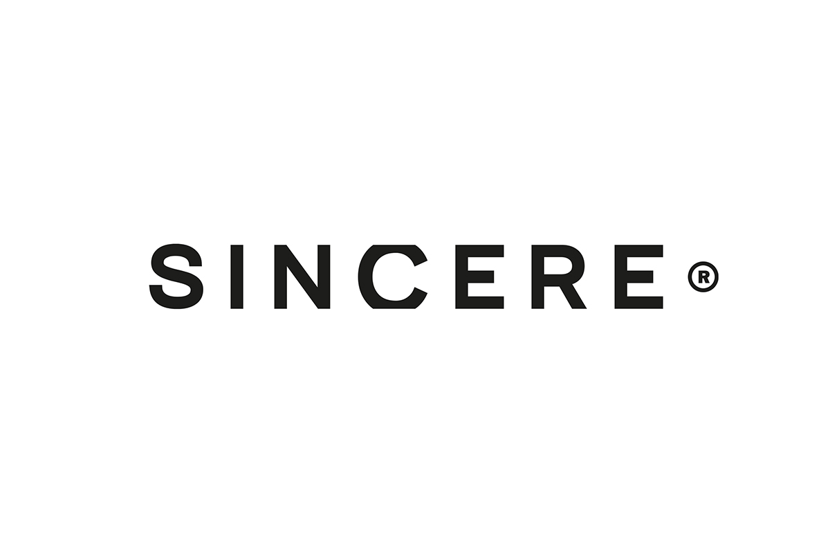 Naming, Branding and Packaging design for SINCERE products using a black and white palette. A silver circle 'lens' highlights the product benefits, with color codes for Hair (Lilac) and Sun (Gold).