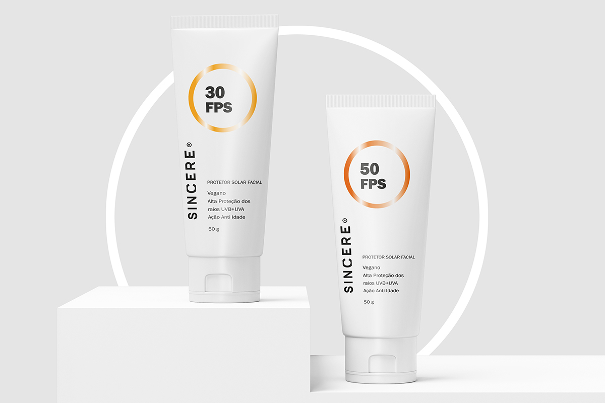 Naming, Branding and Packaging design for SINCERE products using a black and white palette. A silver circle 'lens' highlights the product benefits, with color codes for Hair (Lilac) and Sun (Gold).